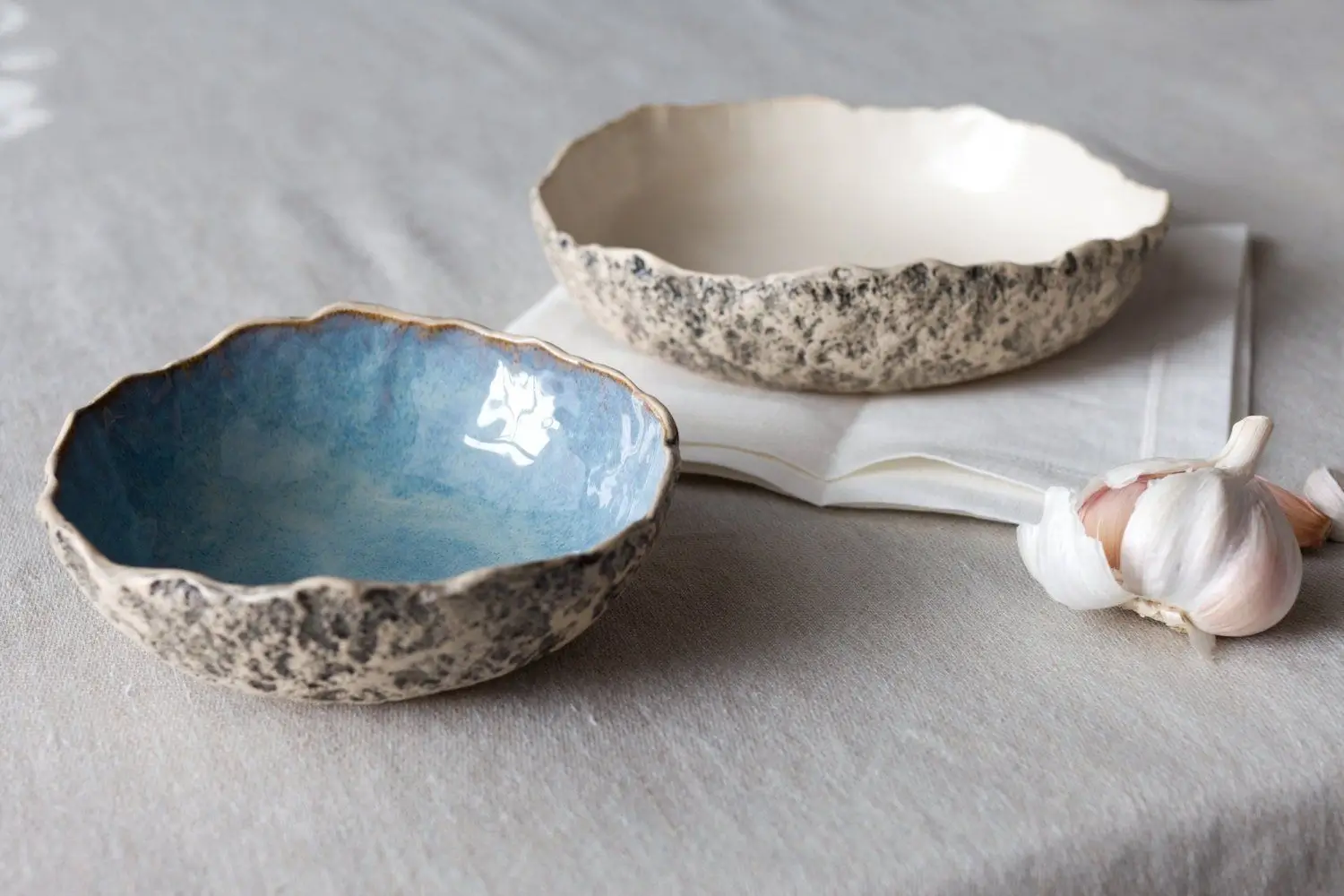 A collection of handmade ceramic bowls.
