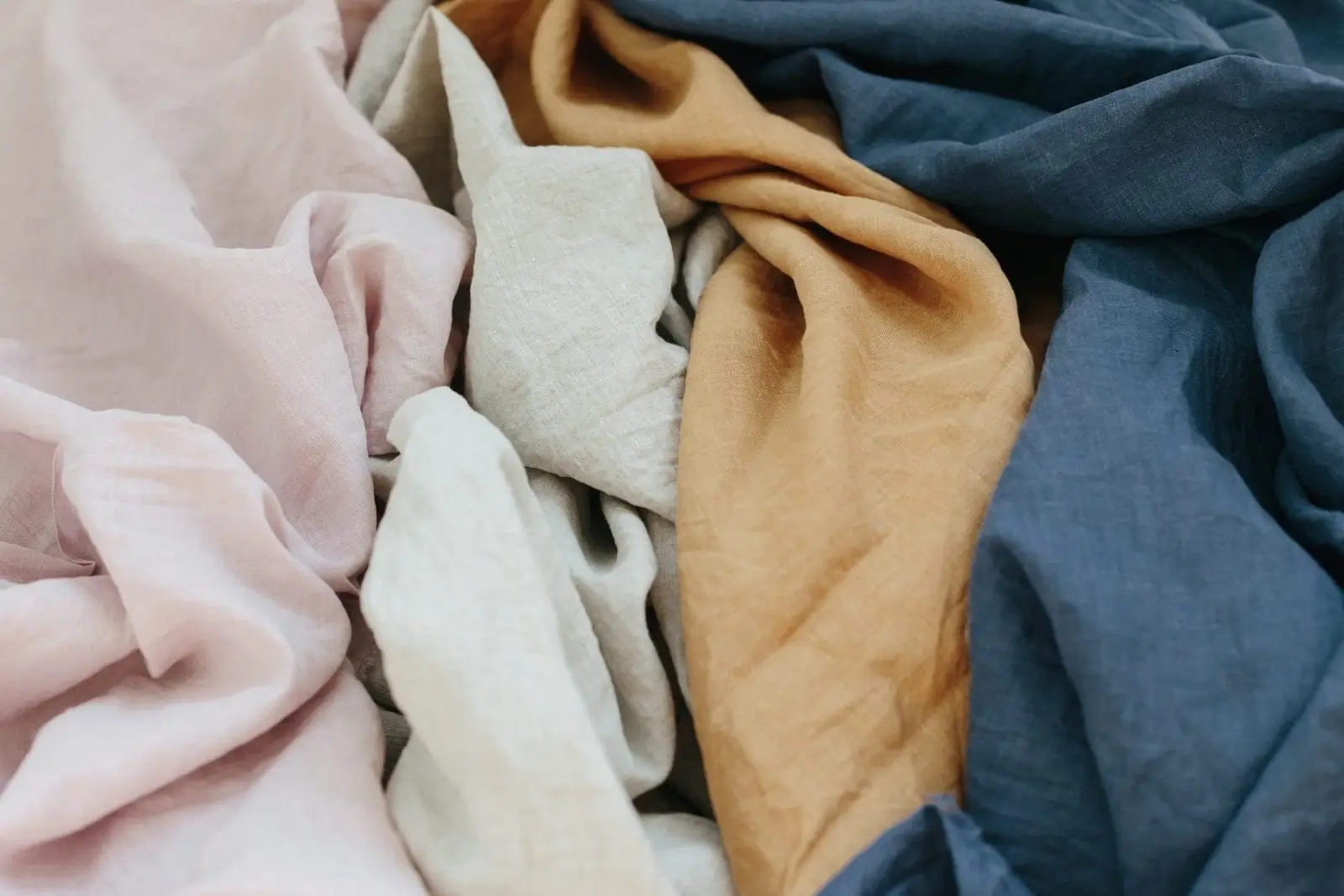 Soft, textured linen fabric folded neatly.