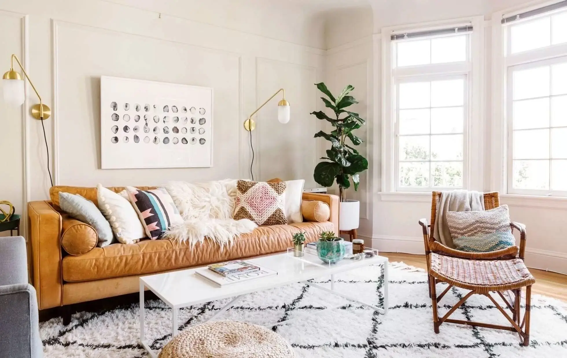 Cozy living room decor with soft textiles.