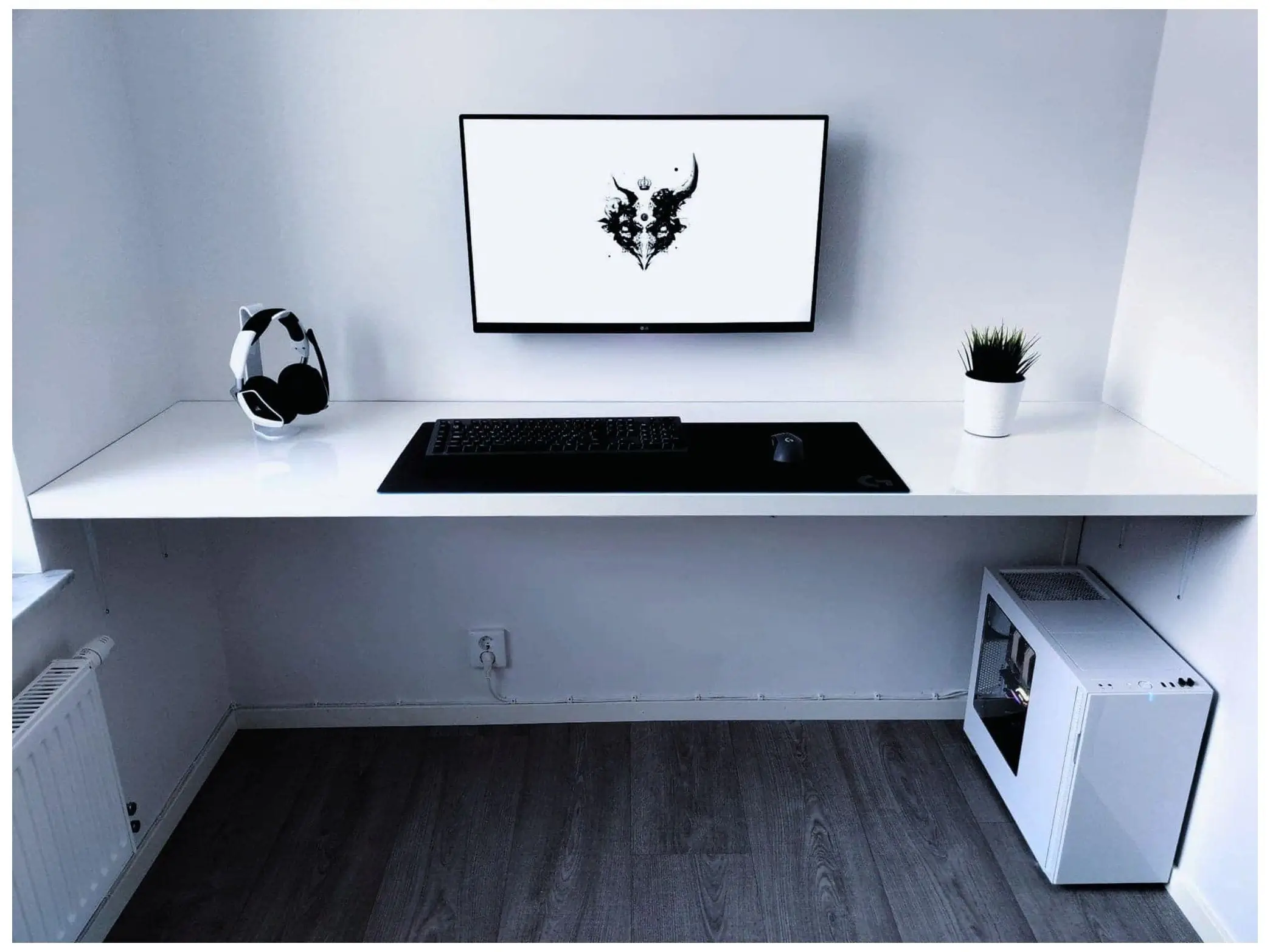 A minimalist and organized home office desk setup.